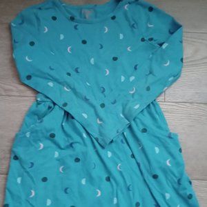 Blue dress with shapes in it and pocket